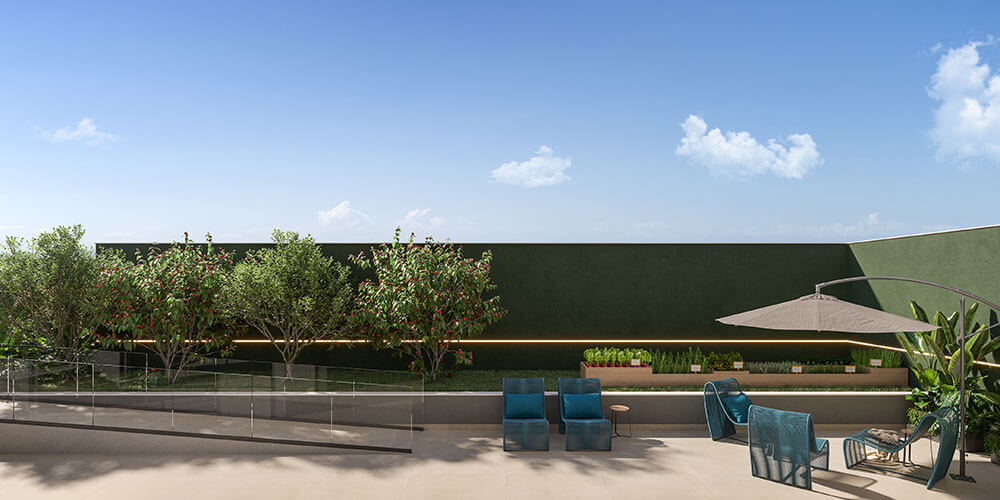 Flow Home — horta coletiva como diferencial de comunidade e sustentabilidade Horta coletiva do Flow Home — quintal com frutíferas no Jardim Tabaetê